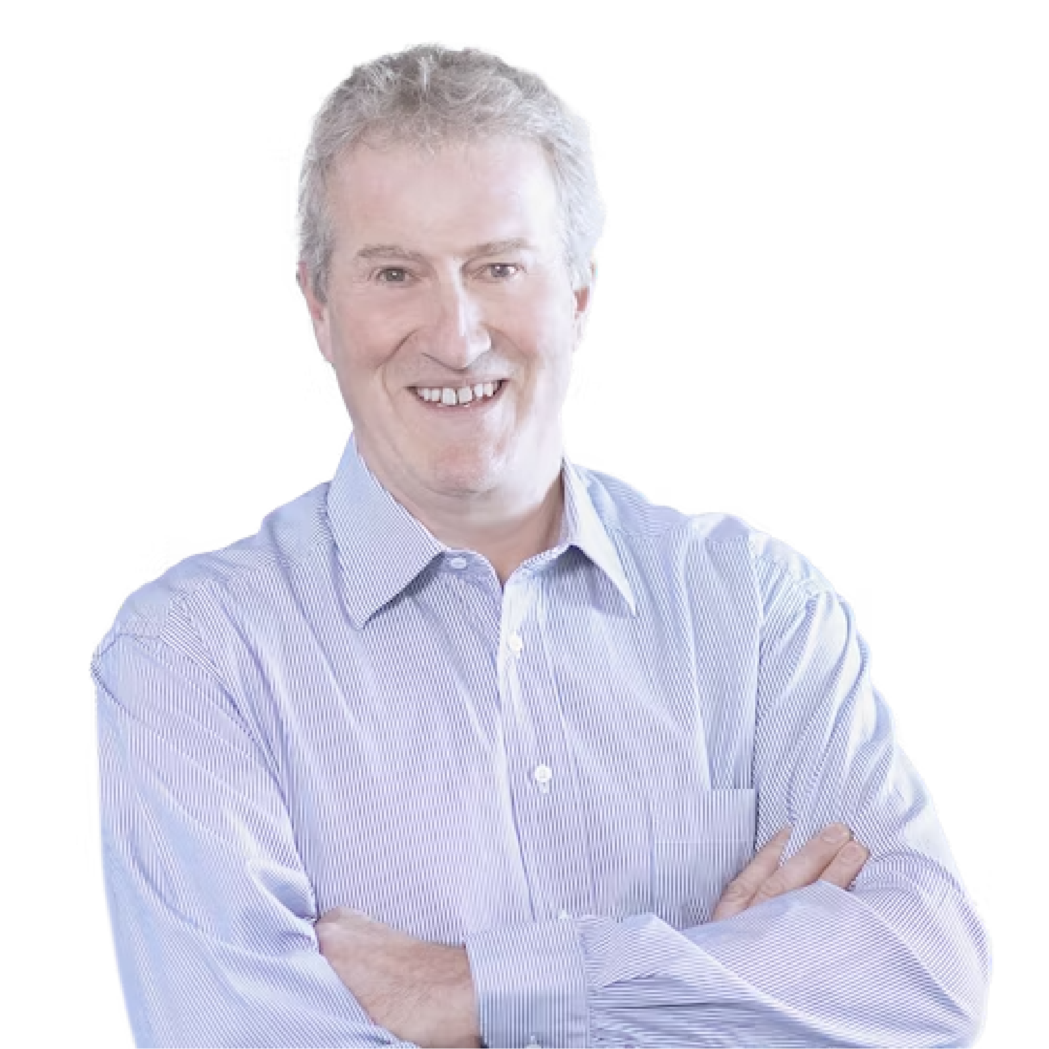 Walter Reichert lächelt mit verschränkten Armen in die Kamera